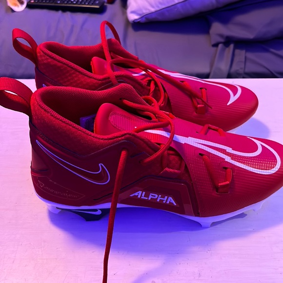 Red Nike football cleats
